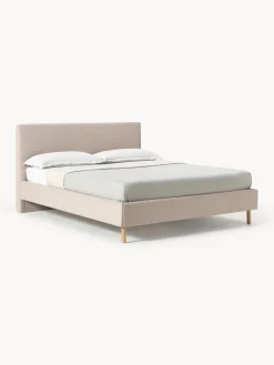 Letto imbottito con piedini in legno Giulia