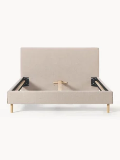 Letto imbottito con piedini in legno Giulia