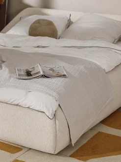 Letto imbottito in bouclé Sofia