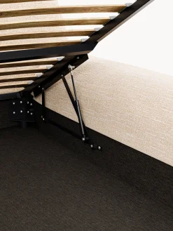 Letto imbottito in bouclé con contenitore Wolke