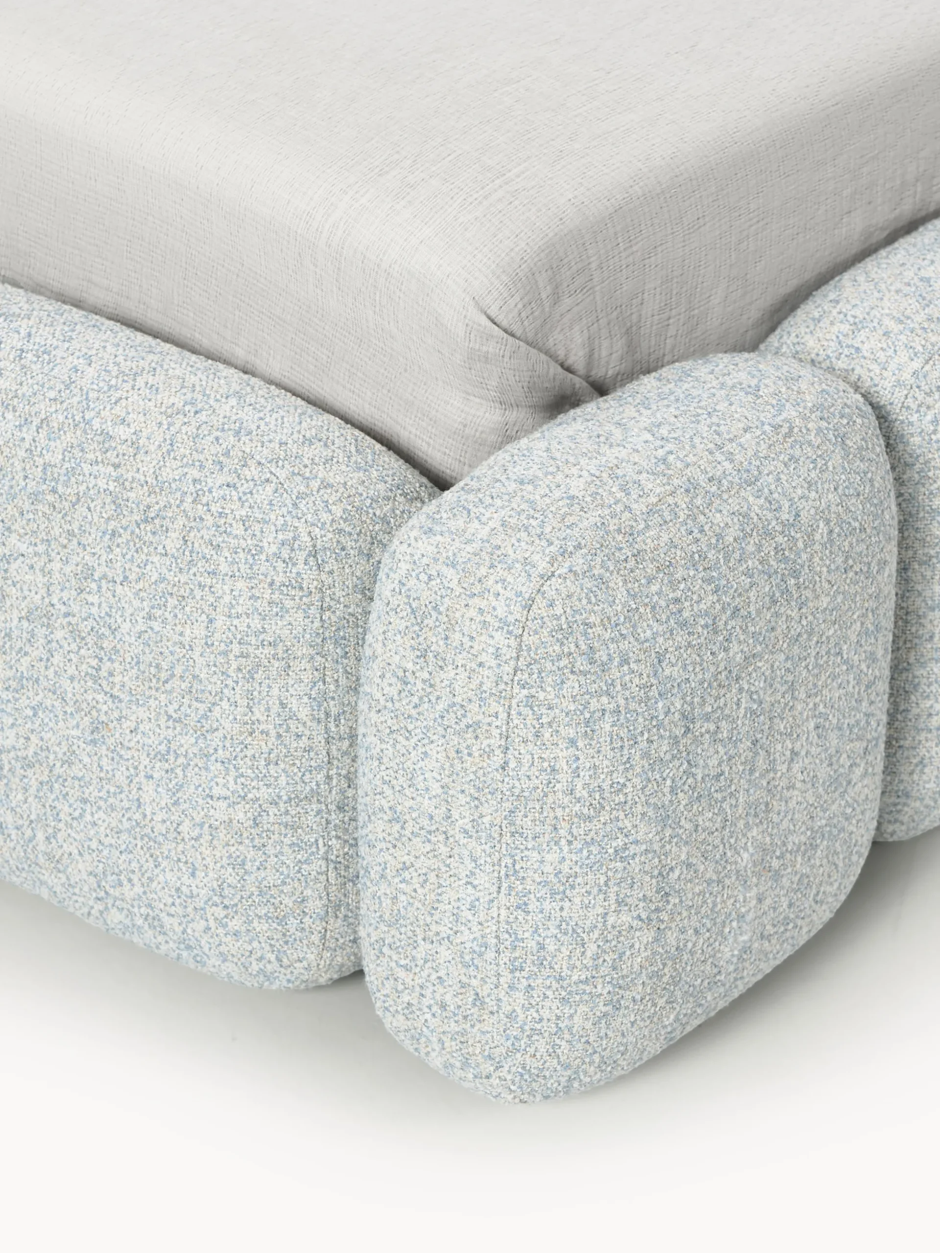 Letto imbottito in teddy bouclé con contenitore Tayla