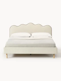 Letto imbottito con testiera ondulata Romy
