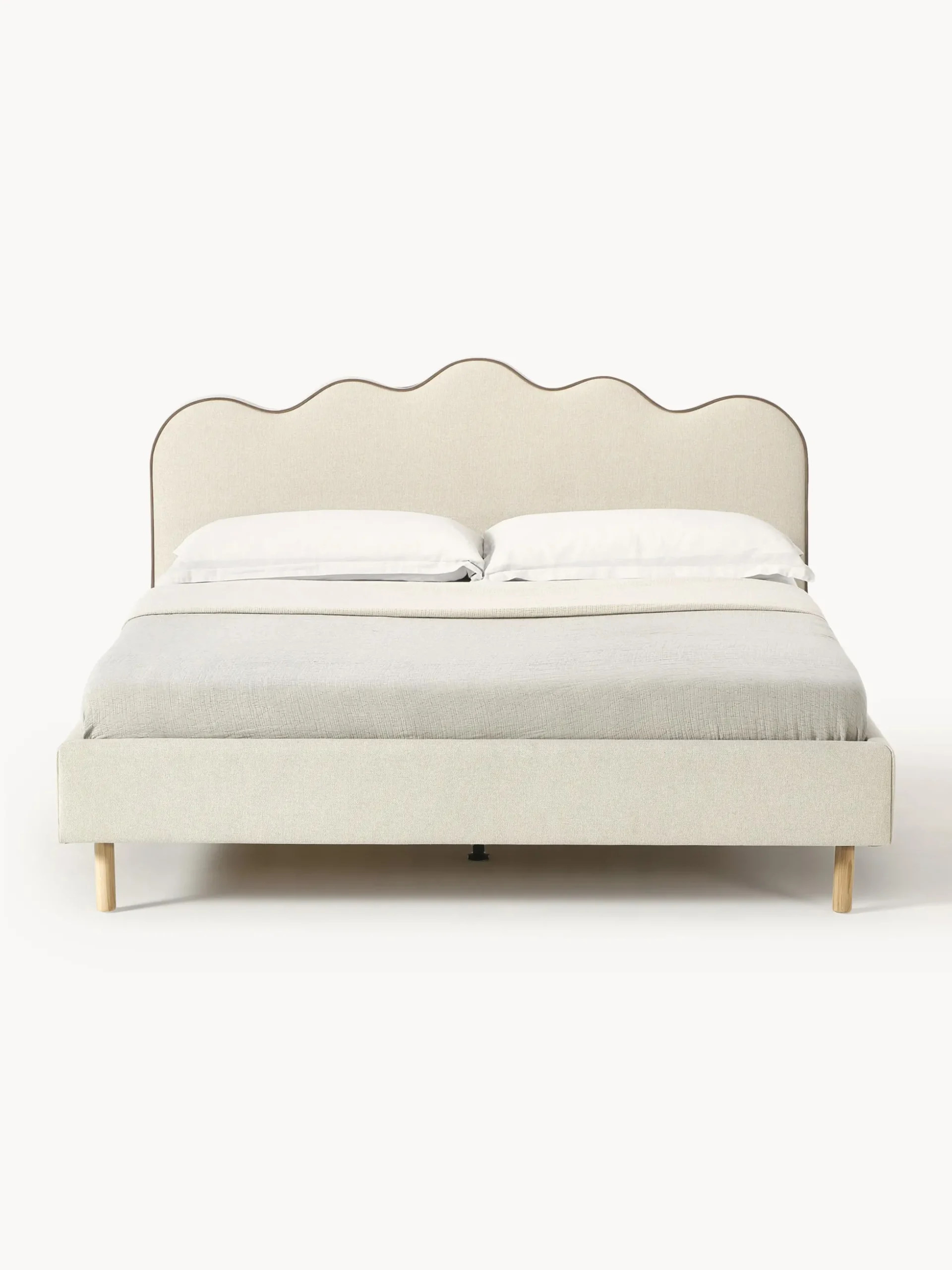 Letto imbottito con testiera ondulata Romy
