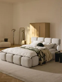 Letto imbottito in bouclé con contenitore Tayla