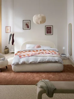 Letto imbottito in bouclé con contenitore Alba
