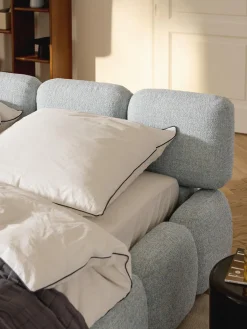 Letto imbottito in bouclé Tayla