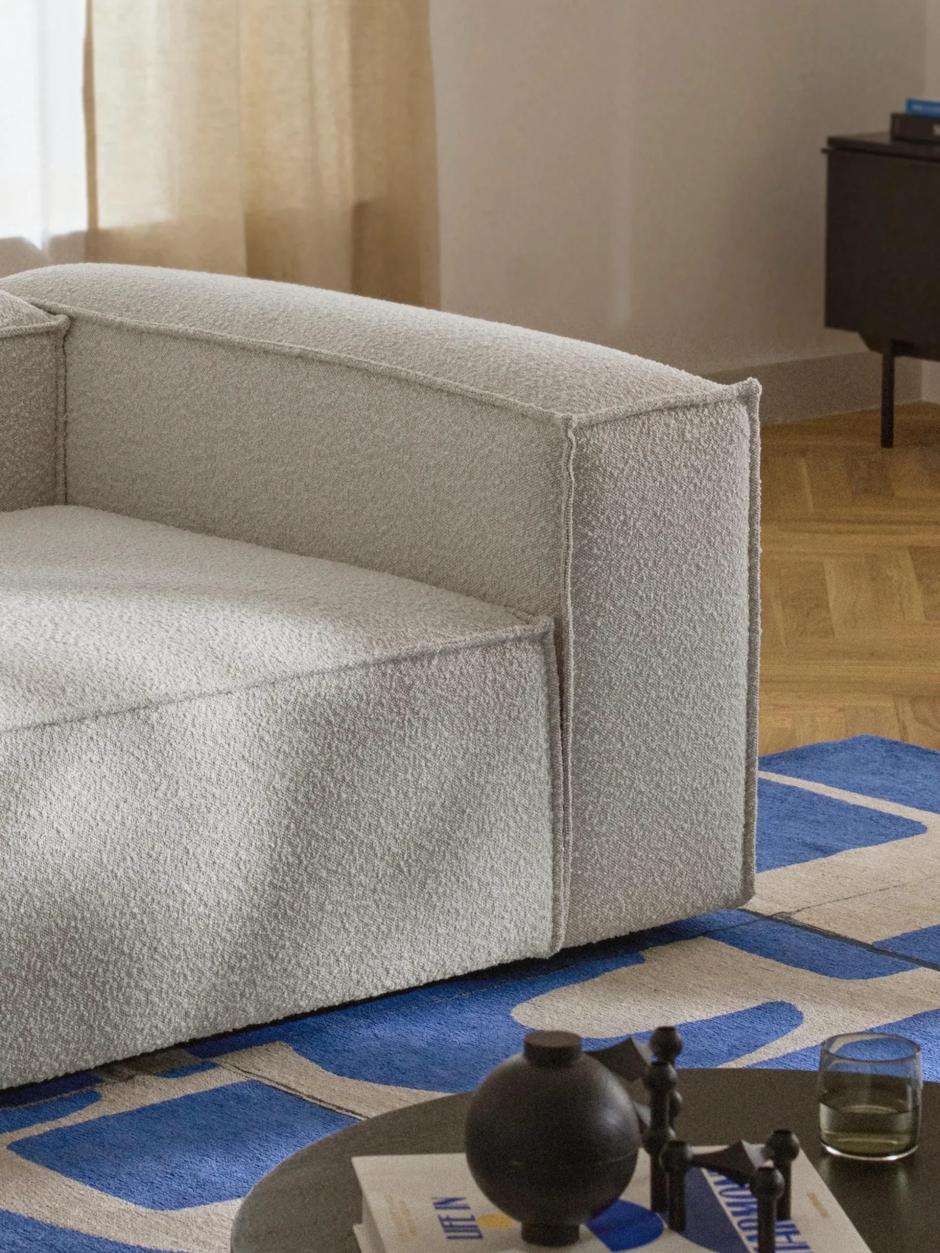 Modulo angolare in bouclé Lennon