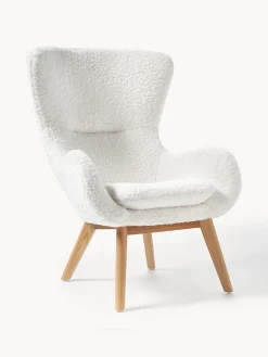 Poltrona in teddy con gambe in legno Wing