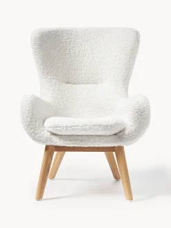 Poltrona in teddy con gambe in legno Wing