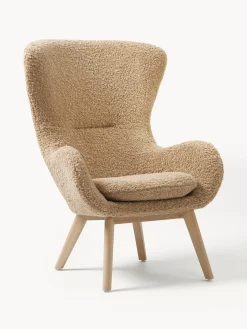 Poltrona in teddy con gambe in legno Wing