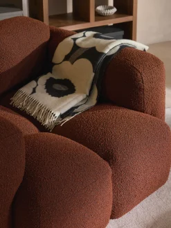 Poltrona lounge in bouclé Tayla