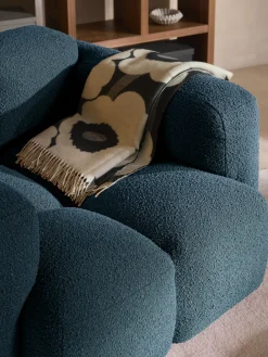 Poltrona lounge in bouclé Tayla