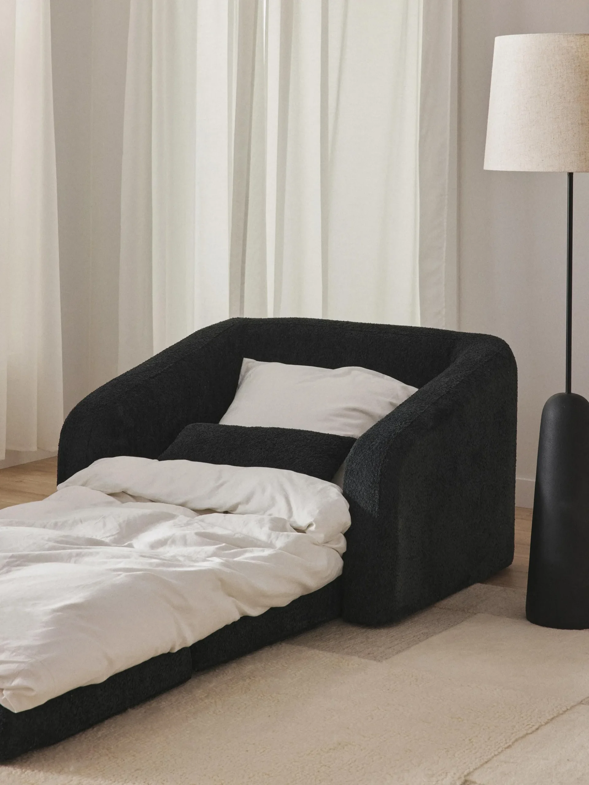 Poltrona letto in teddy-bouclé Eliot