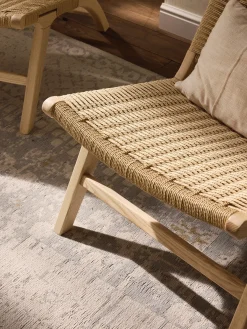 Poltrona lounge con intreccio in rattan in legno di frassino Ira