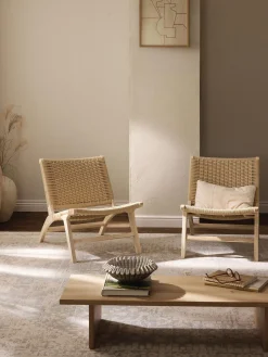 Poltrona lounge con intreccio in rattan in legno di frassino Ira