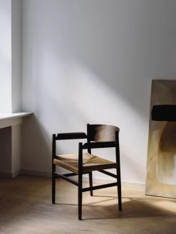 Poltroncina con braccioli seduta intrecciata Nestor