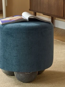 Pouf imbottito con piedini a sfera effetto marmo Lino
