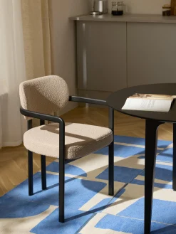 Sedia con braccioli in bouclé Adrien