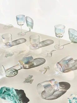 Set di 4 bicchieri da vino in vetro soffiato con rilievo rigato e lucentezza madreperlacea Juno
