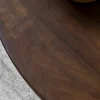 Tavolino da salotto rotondo in legno di mango Sculpt