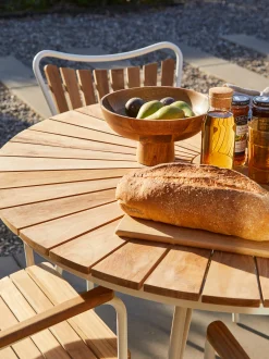 Tavolo da giardino rotondocon piano in legno di teak Hard & Ellen, varie misure